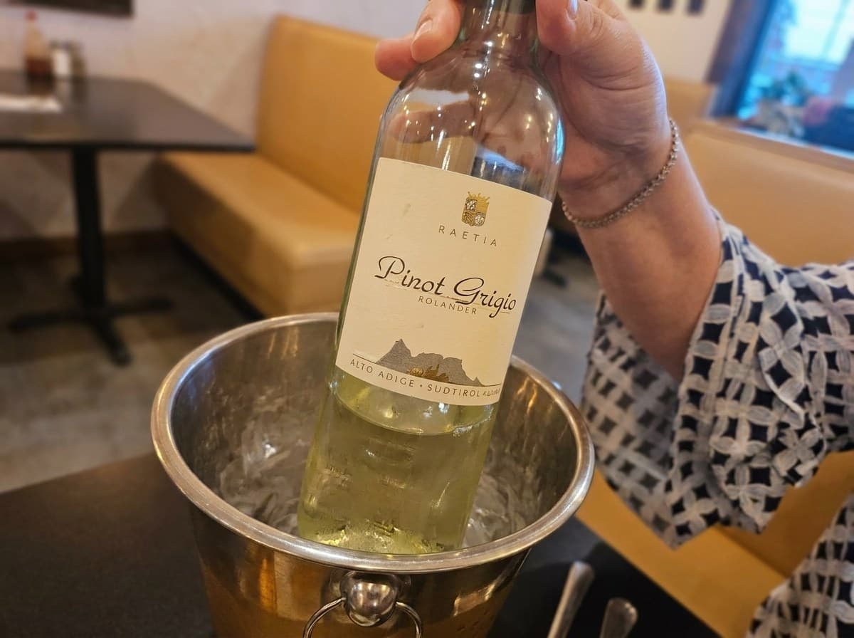 A bottle of wine poured at one of Tasty's wine dinners