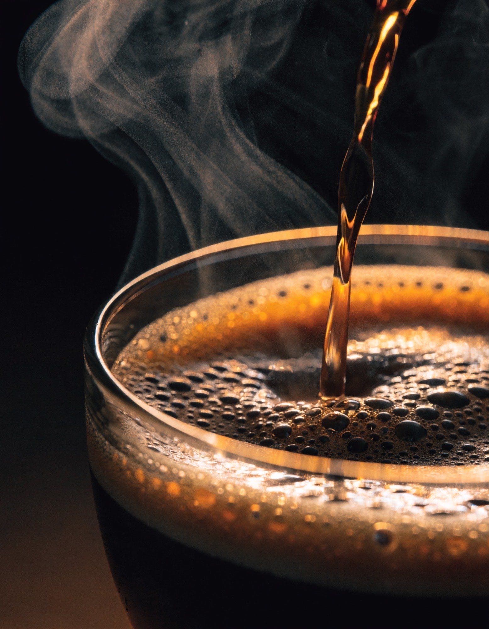 Espresso pour with rising steam at Tasty in Gastonia